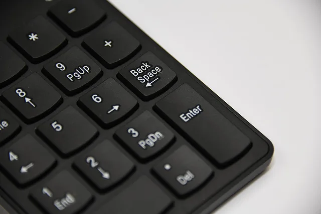 backspace, keyboard, office, typing, number, gray office, gray numbers, gray keyboard, backspace, backspace, backspace, backspace, backspace. How Ottawa-Gatineau bilingual offices handle quiet keyboard etiquette