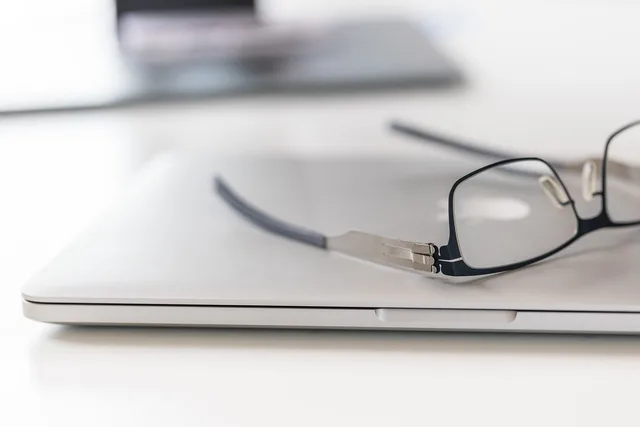 glasses, home office, macbook, desk, computer, workplace, laptop, office, mac, designer. Quiet workspace assessments: privacy questions to ask first