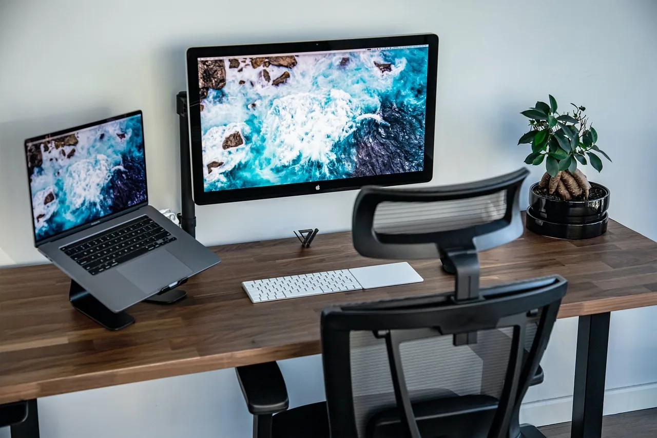 pc, computer, laptop, desk, office desk, computer chair, workplace, workspace, office, minimalist, clean, neat, neat work place, interior design, desk, computer chair, computer chair, computer chair, computer chair, computer chair, workspace, neat, neat. What is a silent workspace budget actually made of, bucket by bucket?